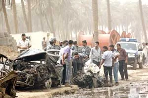 القتلى و الجرحى 140 شخصا انفجار سيارتين مفخختين في بغداد